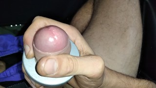 Jerking off this Big Fat Cock in the car with a Huge Nut Inserted in which I Cum